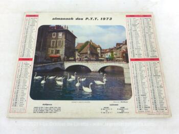 Ancien almanach des PTT de 1972 sur papier cartonné léger avec la photo de la Savoie sous la neige d'un coté et le port de Villefranche sur Mer de l'autre.