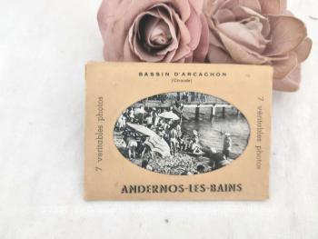 Voici un petit recueil en forme de livret avec 7 photos anciennes en noir et blanc reliées entre elles et pliées en accordéon représentant des vues d'Andernos les Bains sur le Bassin d'Arcachon en Gironde.