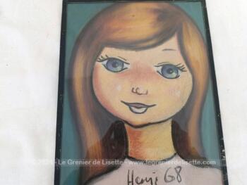 Voici un duo de portraits d'enfants réalisée en pastel, habillé d'une vitre et scellé sur un carton par de l'adhésif noir. Ces portraits au traits naïfs sont signés "Henri 68" . Ils datent donc de 1968 et sont des pièces uniques.